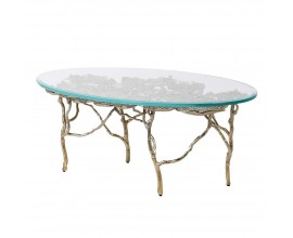 Dizajnový art deco konferenčný stolík Lilypad so zlatou podstavou z kovu a oválnou sklenenou doskou 120cm 
