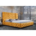 Moderná dizajnová manželská posteľ Kreon so zamatovým poťahom žltej farby s chesterfield prešívaním