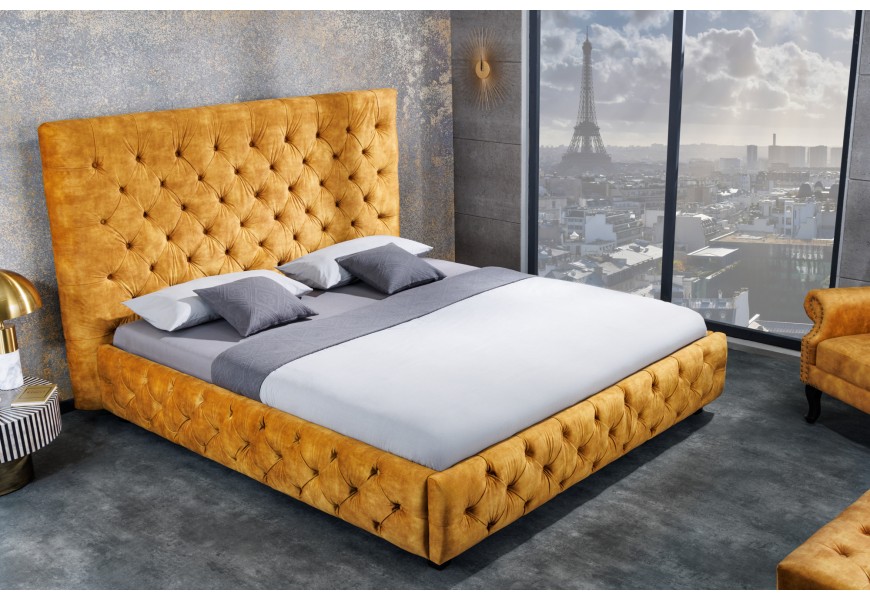 Štýlová nadčasová manželská posteľ Kreon v žltom prevedení so zamatovým poťahon