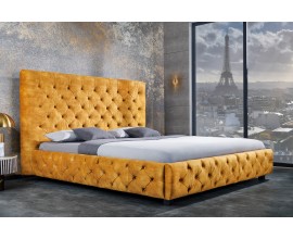 Moderná manželská posteľ Kreon so zamatovým poťahom žltej farby s chesterfield prešívaním 160x200cm