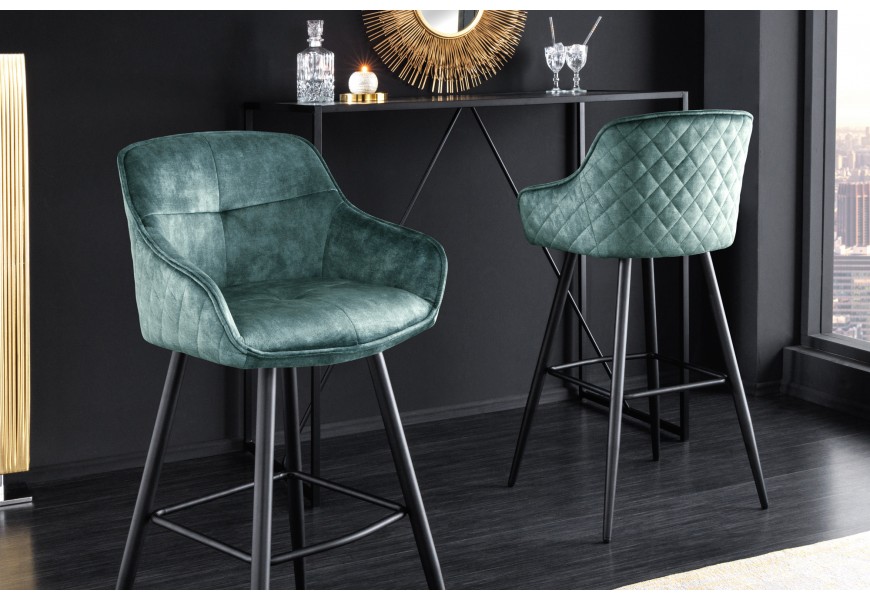 Dizajnová glamour barová stolička Rufus s modrozeleným zamatovým poťahom a čiernou kovovou konštrukciou 100cm