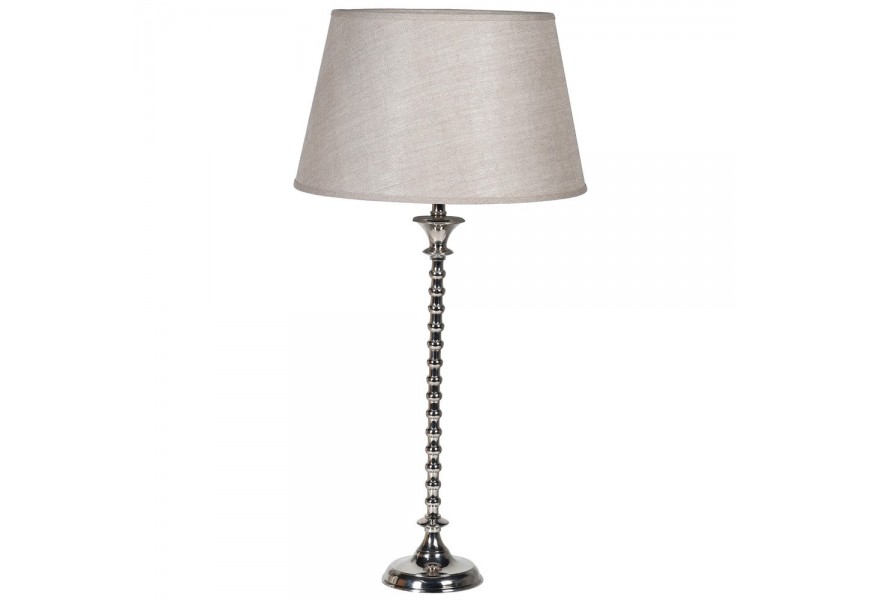 Štýlová vintage stolná lampa Impala so striebornou konštrukciou z kovu a bielym ľanovým tienidlom