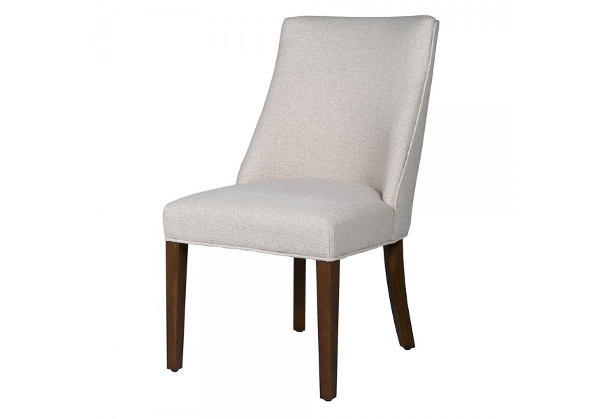 Dizajnová moderná jedálenská stolička Almera s krémovým textilným poťahom a hnedými nožičkami z dreva