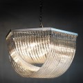Závesný sklenený luster Lania so sklenenými prútmi a so striebornou kovovou konštrukciou v art deco štýle