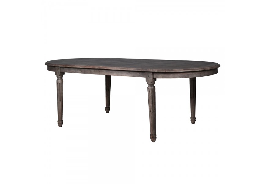 Luxusný vidiecky oválny jedálenský stôl Marqueta s vrchnou doskou s dizajnom parkiet a rustikálnymi vyrezávanými nožičkami z akáciového dreva so sivým náterom