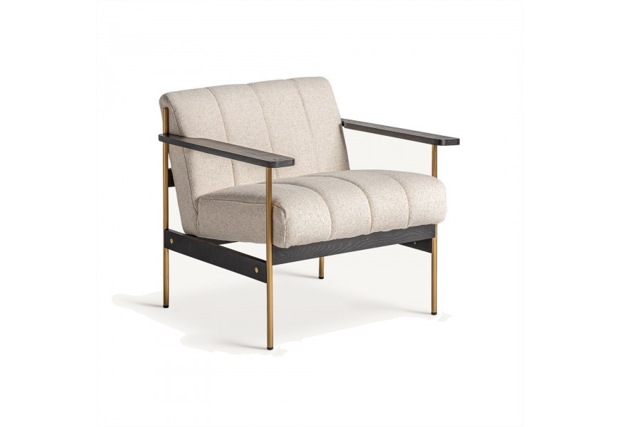 Luxusné art deco čalúnené kreslo s drevenou čiernou a zlatou kovovou konštrukciou s prešívaním a poťahom z textílie v béžovej farbe