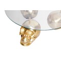 Dizajnový okrúhly konferenčný stolík Hamlet s tromi nožičkami v tvare lebiek v zlatej farbe a sklenenou vrchnou doskou 90 cm