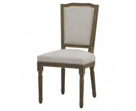 Luxusná čalúnená jedálenská stolička Antiquités Francaises vo vidieckom štýle s ručne vyrezávaným zdobením na drevených nožičkách a opierke v pieskovej sivej farbe s bielo sivým štruktúrovaným poťahom