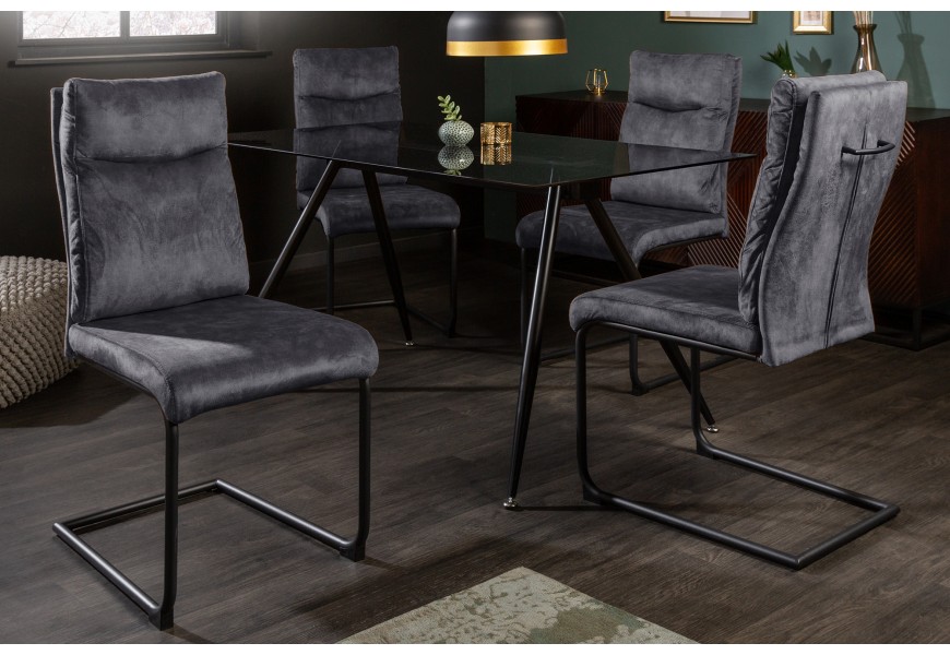 Dizajnová jedálenská stolička Vitto s tmavo sivým čalúnením s kovovými nožičkami v čiernom farebnom prevedení
