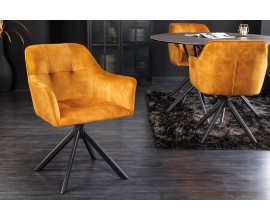 Dizajnová otočná stolička Devon so zamatovým poťahom okrovej farby a čiernymi kovovými nohami