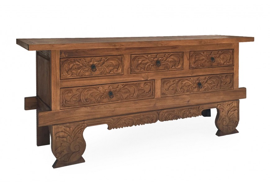 Luxusná orientálna komoda Lhasa z masívneho teakového dreva v hnedej farbe s piatimi zásuvkami s vyrezávaným ornamentálnym zdobením a kovovými úchytkami