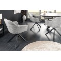 Štýlová bouclé otočná jedálenská stolička Mariposa v sivej farbe s čiernymi kovovými nožičkami 83 cm