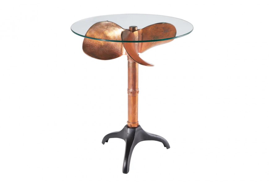 Dizajnový koloniálny príručný stolík Helice s kovovou podstavou v podobe lodnej vrtule v medenej farbe a s okrúhlou sklenenou doskou