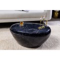 Štýlový konferenčný stolík Stone v čiernej farbe v atypickom tvare s mramorovým dizajnom z kovu 76 cm