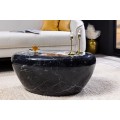 Štýlový konferenčný stolík Stone v čiernej farbe v atypickom tvare s mramorovým dizajnom z kovu 76 cm