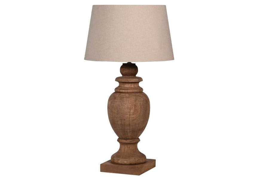 Dizajnová koloniálna masívna nočná lampa Mistic s vyrezávanou nohou v hnedej farbe z mangového dreva a s ľanovým béžovým tienidlom v tvare zrezaného kužeľa