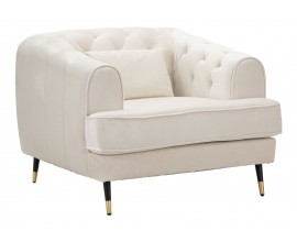 Glamour čalúnené kreslo Lana v krémovej farbe v štvorcovom tvare so zamatovým poťahom a prešívaním s nožičkami v čiernej farbe s detailmi v zlatej farbe