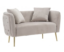 Art deco obdĺžniková dvojmiestna sedačka Zeran s béžovým zamatovým poťahom s prešívaním a zlatými kovovými nožičkami 127 cm