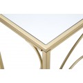 Dizajnový glamour konzolový stolík Nastrillo so zrkadlovou vrchnou doskou a zlatou podstavou s ozdobnými oblúkmi 140 cm