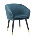 Dizajnová art deco jedálenská stolička Aurelle zaobleného tvaru čalúnená semišovou textíliou s kanálikovým prešívaním v petrolejovej modrej farbe s čiernymi nožičkami so zlatými detailmi