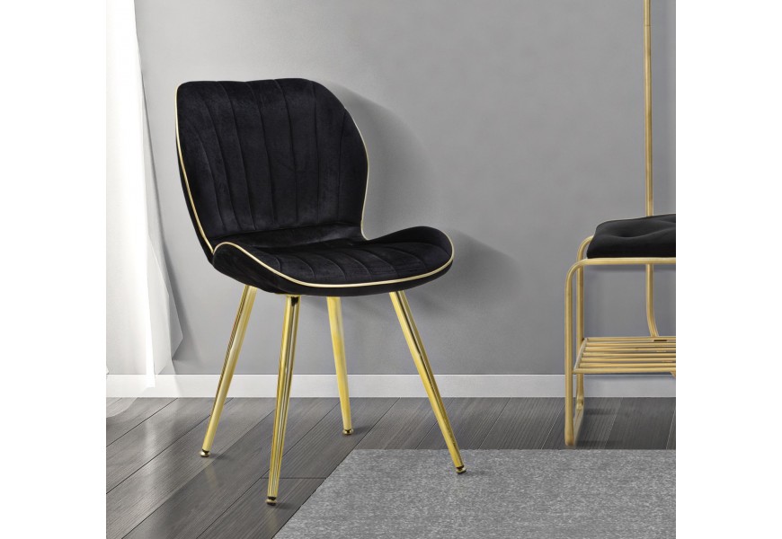 Art deco čalúnená prešívaná jedálenská stolička Dorena so zamatovým čiernym poťahom a zlatými kovovými valcovými nožičkami 77 cm