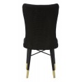 Art deco jed&aacute;lensk&aacute; stolička Amara s textiln&yacute;m poťahom s geometrick&yacute;m vzorom a čiernymi nožičkami so zlat&yacute;mi koncami 99 cm