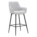 Moderná barová stolička Eli s ergonomickým operadlom, čalúneným sedákom vo svetlo šedej látke a štíhlymi kovovými nožičkami v čiernom prevedení
