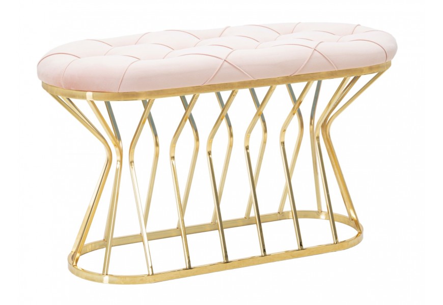 Art deco čalúnená oválna lavica Ziglia so svetlým ružovým poťahom s ozdobným chesterfield prešívaním a podstavou z kovu v lesklej zlatej farbe z ohýbaných kovových prútov