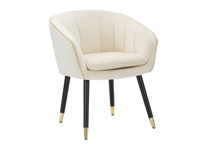 Dizajnová art deco jedálenská stolička Aurelle oblého tvaru čalúnená textíliou v béžovej farbe s čiernymi nožičkami so zlatými detailmi