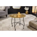 Dizajnový orientálny okrúhly konferenčný stolík Omar s kovovou zlatou doskou a čiernou konštrukciou 60 cm