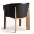 Luxusná škandinávska béžová jedálenská stolička Naria oblého tvaru z masívneho dreva s čiernym koženým čalúnením 75 cm