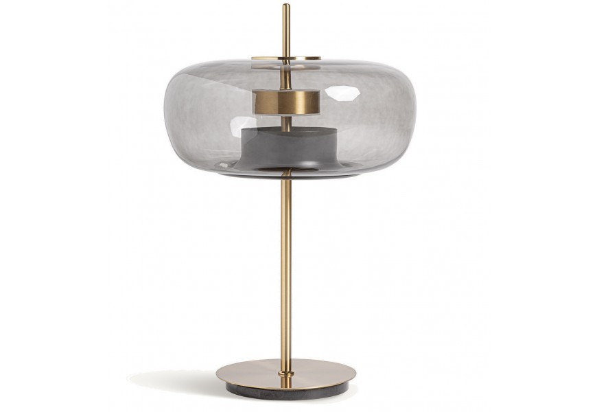 Glamour nočná LED lampa Gana v atypickom tvare s nohou z kovu v zlatej farbe s akrylovým náterom s krytom z kryštálu v okrúhlom oblom tvare so zadymeným efektom