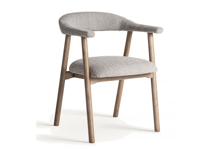 Luxusná jedálenská stolička Bibia v klasickom tvare v škandinávskom modernom štýle s nožičkami z masívneho jaseňového dreva v hnedej farbe s textilným poťahom v sivej farbe s čalúnením