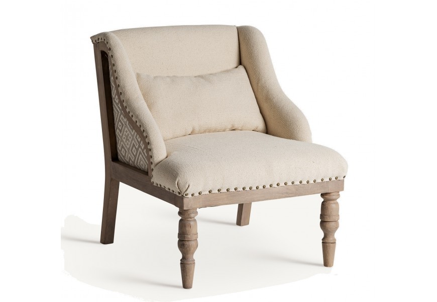 Luxusné provensálské čalúnené krémové kreslo Norod s vybíjanými nitmi so vzorom a masívnymi hnedými nožičkami 75 cm