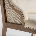 Luxusné provensálské čalúnené krémové kreslo Norod s vybíjanými nitmi so vzorom a masívnymi hnedými nožičkami 75 cm
