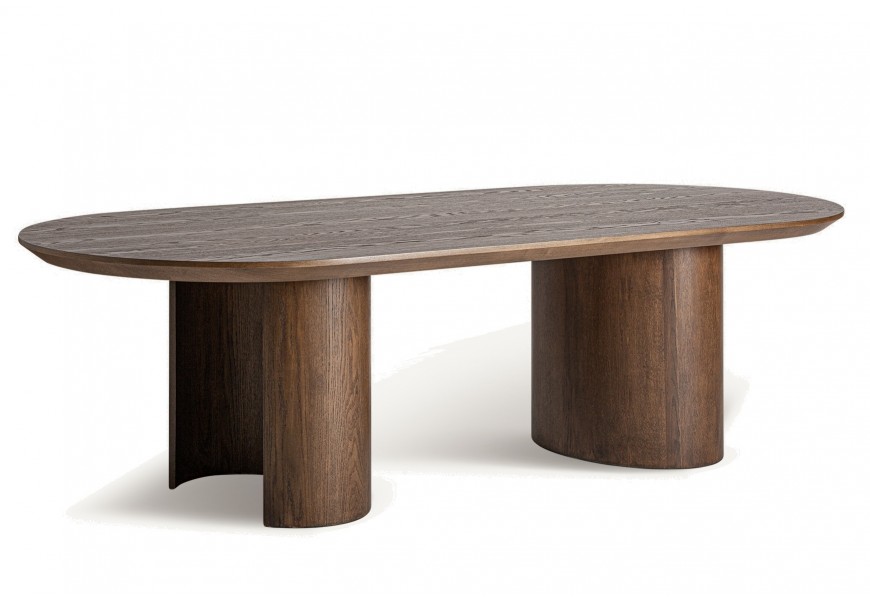 Luxusný jedálenský stôl Nisi z masívneho dubového dreva v hnedej farbe s výraznou štruktúrou letokruhov s atypickými oválnymi otvorenými nohami a vrchnou doskou v oválnom tvare s kosenými rohmi