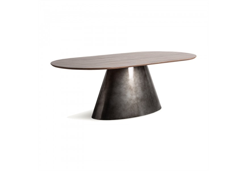 Luxusný glamour jedálenský stôl Derinal v oválnom tvare s mohutnou nohou v striebornej farbe z kovu s masívnou vrchnou doskou z mangového dreva v hnedej farbe