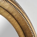 Luxusné vintage okrúhle nástenné zrkadlo Malisa v zlatej starožitnej farbe s vyrezávaným rámom s kovovým efektom 81 cm