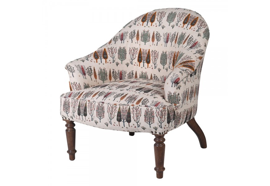 Luxusné retro kreslo Misaj s čalúnením a bavlneným poťahom s béžovým poťahom s lesným motívom stromov a masívnymi mangovými nožičkami s vyrezávaním v hnedej farbe