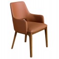 Luxusné moderné jedálenské kreslo Vita Naturale s nízkymi bočnými opierkami s drevenými nohami v orechovej hnedej farbe s kresbou letokruhov s poťahom z eko kože v koňakovo hnedom odtieni