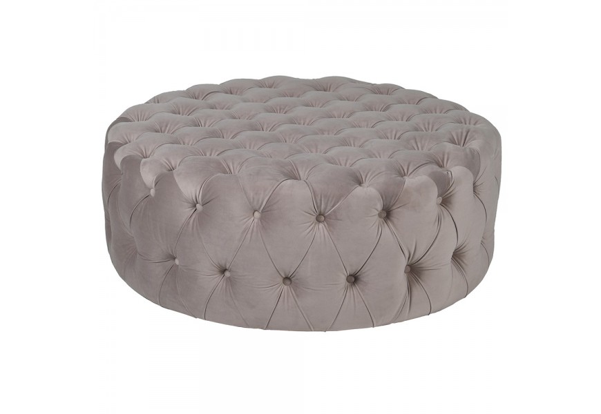 Luxusná chesterfield sivá taburetka Sadie s poťahom zo zamatu s dekoratívnym prešívaním s okrúhlymi gombíkmi okrúhleho tvaru bez nožičiek