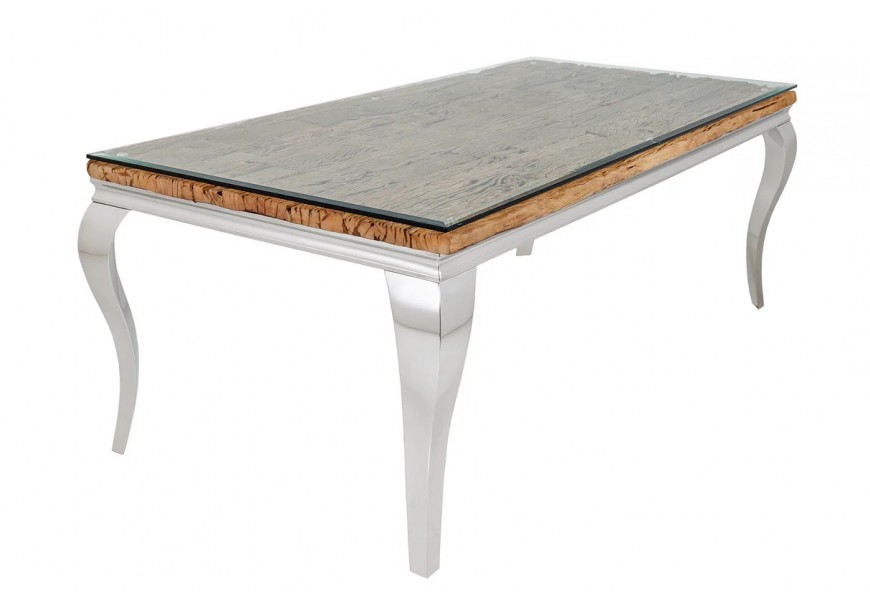 Luxusný glamour jedálenský stôl Modern Barock s konštrukciou z kovu v lesklom chrómovom striebornom prevedení s obdĺžnikovou vrchnou doskou s vrstvou masívneho teakového dreva s výraznou štruktúrou v prírodnej hnedej farbe prekrytou priehľadným bezpečnostným sklom