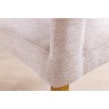 Moderná art deco čalúnená béžová jedálenská stolička Lunit s textúrovaným poťahom a kovovými zlatými nožičkami 81 cm