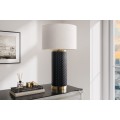 Dizajnová art deco stolná lampa Draconia s čiernou reliéfnou keramickou nohou a bielym tienidlom so zlatým akcentom 70 cm