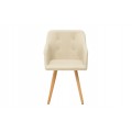 Dizajnová škandinávska čalúnená krémová jedálenská stolička Scandinavia s opierkami na ruky a masívnymi hnedými nohami 85 cm