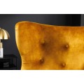 Art deco kreslo Bolte s horčicovým žltým zamatovým poťahom a vysokou chrbtovou opierkou s dizajnom ušiaka 106 cm