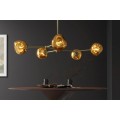 Glamour zlatý závesný luster Kalan s piatimi sklenenými tienidlami v tvare kvapiek na kovovej konštrukcii 91 cm