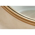 Art deco okrúhle nástenné zrkadlo Auri so zlatým kovovým rámom a zadnou výstužou z dyhovaného dreva 58 cm