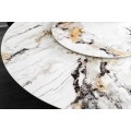 Dizajnový biely mramorový okrúhly jedálenský stôl Siam s otočnou doskou a s čiernymi prekríženými nohami 150 cm