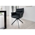 Moderná otočná jedálenská stolička Corvin z čiernej kože s textílnym poťahom s opierkami na ruky s kovovými nožičkami 82 cm
